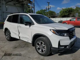 2023 Honda Passport TrailSport with VIN 5FNYF8H6XPB026464, listed as a Copart auction lot 52736395 with 14,281 mi miles and Salvage title. Bid and sale history available at DreamBid. Image 4.