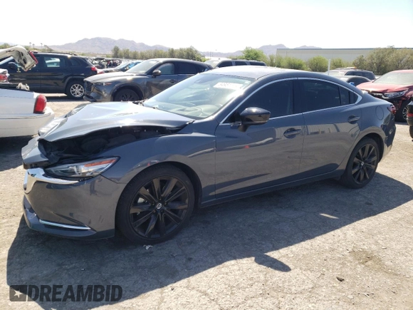 2021 Mazda 6 Grand Touring Reserve with VIN JM1GL1WY4M1617118, listed as a Copart auction lot 54951114 with 14,670 mi miles and Salvage Title. Bid and sale history available at DreamBid. Image 1.