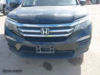 2017 Honda Pilot EX-L with VIN 5FNYF5H5XHB040842, listed as a IAAI auction lot 41778935 with 151,464 mi miles. Bid and sale history available at carsss.com. Image 6.