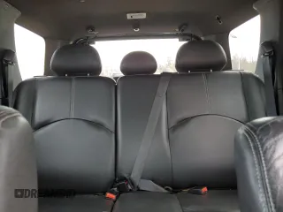 2008 Mercury Mariner Premier z VIN 4M2CU97178KJ40982, wystawiony jako Copart lot #51683375 z przebiegiem 127 132 mil mil oraz Szkody całkowita. Historia ofert i sprzedaży dostępna na DreamBid. Obrazek 10.