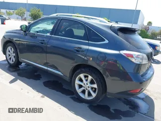 2010 Lexus RX 350 with VIN 2T2BK1BA8AC061209, listed as a IAAI auction lot 42105424 with 242,961 mi miles. Bid and sale history available at carsss.com. Image 3.