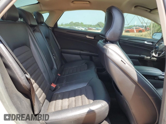 2018 Ford Fusion SE z VIN 3FA6P0HD3JR238137, wystawiony jako Copart lot #54828205 z przebiegiem 131 221 mil mil oraz Szkoda całkowita • Salvage title. Historia ofert i sprzedaży dostępna na DreamBid. Obrazek 10.