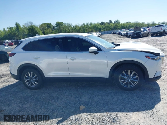 2019 Mazda CX-9 Touring z VIN JM3TCACY3K0333931, wystawiony jako IAAI lot #41968519 z przebiegiem 102 992 mil mil oraz . Historia ofert i sprzedaży dostępna na DreamBid. Obrazek 13.
