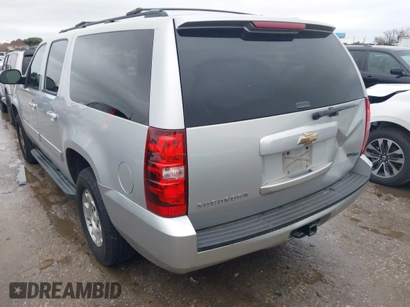 2011 Chevrolet Suburban LS with VIN 1GNSCHE06BR188407, listed as a IAAI auction lot 41453215 with 232,667 mi miles. Bid and sale history available at carsss.com. Image 3.
