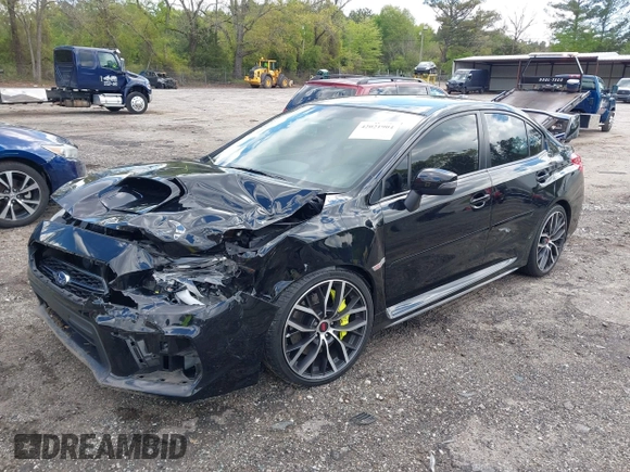 2021 Subaru WRX STI with VIN JF1VA2S66M9812006, listed as a IAAI auction lot 42021904 with 37,792 mi miles and . Bid and sale history available at DreamBid. Image 2.