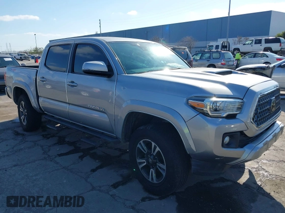 2018 Toyota Tacoma SR with VIN 3TMCZ5AN6JM185891, listed as a IAAI auction lot 41450665 with 53,749 mi miles and . Bid and sale history available at DreamBid. Image 1.