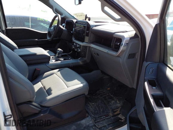 2023 Ford F-150 Lightning Pro with VIN 1FTVW1EL2PWG18764, listed as a IAAI auction lot 41908278 with 16,276 mi miles and . Bid and sale history available at DreamBid. Image 5.