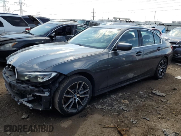 2019 BMW 3 Series 330i with VIN WBA5R1C55KAJ98853, listed as a Copart auction lot 50699315 with 101,110 mi miles and Salvage title. Bid and sale history available at DreamBid. Image 1.