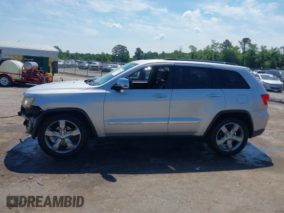 2011 Jeep Grand Cherokee Overland with VIN 1J4RR6GGXBC526649, listed as a IAAI auction lot 42162327 with 185,129 mi miles and . Bid and sale history available at DreamBid. Image 14.