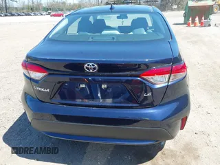2022 Toyota Corolla LE with VIN 5YFEPMAE8NP320053, listed as a IAAI auction lot 42020183 with 6,673 mi miles and . Bid and sale history available at carsss.com. Image 16.