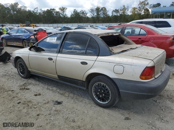1999 Saturn SL with VIN 1G8ZH5280XZ178863, listed as a Copart auction lot 73660474 with 195,738 mi miles and Salvage Title. Bid and sale history available at carsss.com. Image 2.