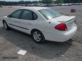 2000 Ford Taurus SEL with VIN 1FAFP56SXYA284955, listed as a IAAI auction lot 42104568 with 154,999 mi miles. Bid and sale history available at carsss.com. Image 3.