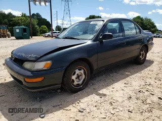1997 Toyota Corolla with VIN 1NXBA02E5VZ633653, listed as a Copart auction lot 58500395 with 276,946 mi miles and Salvage title. Bid and sale history available at DreamBid. Image 1.