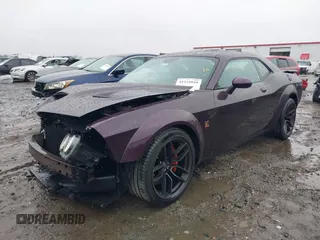 2021 Dodge Challenger R/T Scat Pack z VIN 2C3CDZFJ2MH586535, wystawiony jako IAAI lot #41224949 z przebiegiem 32 977 mil mil oraz . Historia ofert i sprzedaży dostępna na DreamBid. Obrazek 18.