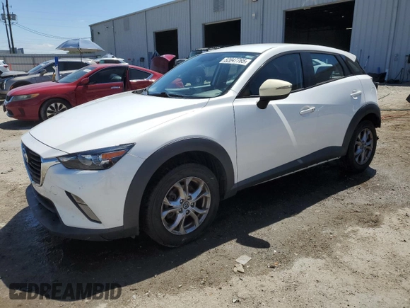 2016 Mazda CX-3 Touring with VIN JM1DKDC71G0130858, listed as a Copart auction lot 52047765 with 115,299 mi miles and Salvage Title. Bid and sale history available at carsss.com. Image 1.