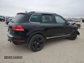 2013 Volkswagen Touareg Lux with VIN WVGEF9BP7DD005872, listed as a Copart auction lot 82618654 with 236,650 mi miles and Salvage Title. Bid and sale history available at DreamBid. Image 3.