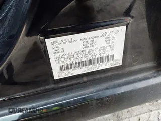 2012 Mitsubishi Galant FE with VIN 4A32B2FF6CE025144, listed as a IAAI auction lot 41781425 with 216,059 mi miles. Bid and sale history available at carsss.com. Image 9.