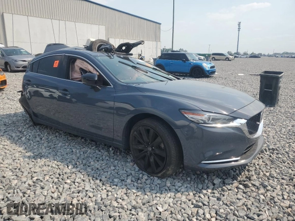 2021 Mazda 6 Carbon Edition with VIN JM1GL1WY6M1606461, listed as a Copart auction lot 51743485 with Not Provided miles and Non Repairable. Bid and sale history available at DreamBid. Image 4.