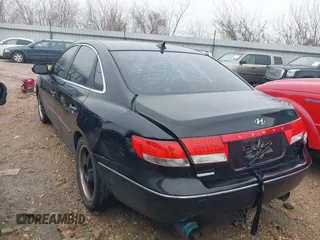 2009 Hyundai Azera Limited with VIN KMHFC46F49A392441, listed as a IAAI auction lot 41285125 with 122,613 mi miles and . Bid and sale history available at DreamBid. Image 3.