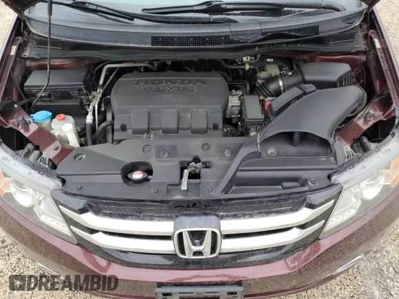 2016 Honda Odyssey Touring Elite with VIN 5FNRL5H9XGB109463, listed as a Copart auction lot 57483225 with 182,450 mi miles and Salvage title. Bid and sale history available at DreamBid. Image 12.