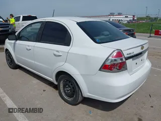 2011 Chevrolet Aveo 1LT with VIN KL1TD5DE7BB139819, listed as a IAAI auction lot 42090773 with 124,559 mi miles and . Bid and sale history available at DreamBid. Image 3.