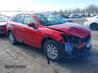 2016 Mazda CX-5 Touring with VIN JM3KE4CY5G0630438, listed as a IAAI auction lot 41877660 with 56,960 mi miles. Bid and sale history available at carsss.com. Image 1.