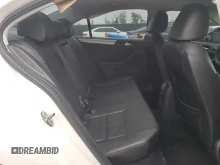 2013 Volkswagen Jetta SE z VIN 3VWDX7AJ9DM368707, wystawiony jako Copart lot #50542785 z przebiegiem 100 395 mil mil oraz Szkoda całkowita • Salvage title. Historia ofert i sprzedaży dostępna na DreamBid. Obrazek 10.