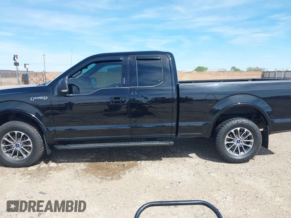 2018 Ford F-150 XL with VIN 1FTEX1EP7JFC21008, listed as a IAAI auction lot 42072145 with 102,679 mi miles and . Bid and sale history available at DreamBid. Image 14.