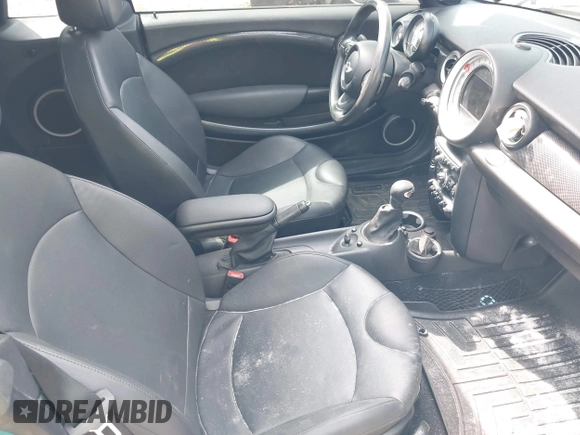 2013 MINI Convertible S with VIN WMWZP3C53DT705016, listed as a IAAI auction lot 42155802 with Not provided miles and . Bid and sale history available at DreamBid. Image 5.