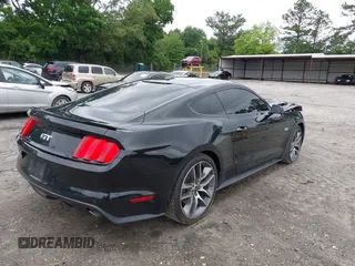 2015 Ford Mustang GT with VIN 1FA6P8CF2F5423037, listed as a IAAI auction lot 42370882 with 149,794 mi miles and . Bid and sale history available at DreamBid. Image 4.