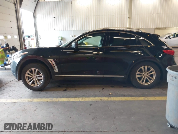 2016 Infiniti QX70 z VIN JN8CS1MW7GM400558, wystawiony jako IAAI lot #40917829 z przebiegiem 149 885 mil mil oraz . Historia ofert i sprzedaży dostępna na DreamBid. Obrazek 14.