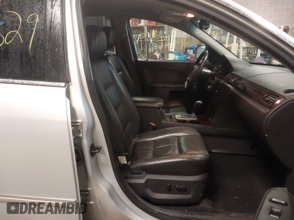 2005 Ford Five Hundred Limited with VIN 1FAFP251X5G108410, listed as a IAAI auction lot 41934529 with 118,202 mi miles and . Bid and sale history available at DreamBid. Image 5.