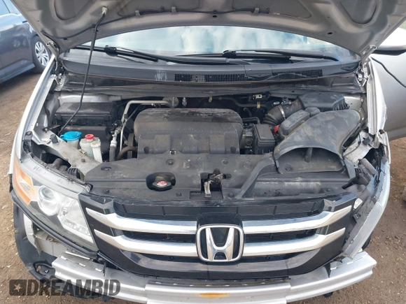 2014 Honda Odyssey EX-L with VIN 5FNRL5H65EB096544, listed as a IAAI auction lot 41903451 with 99,628 mi miles and . Bid and sale history available at carsss.com. Image 10.