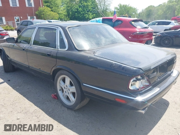 1999 Jaguar XJ with VIN SAJPX1841XC864072, listed as a IAAI auction lot 42176220 with 122,712 mi miles and . Bid and sale history available at DreamBid. Image 3.