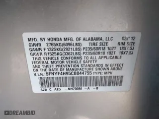2012 Honda Pilot Touring with VIN 5FNYF4H95CB044755, listed as a IAAI auction lot 41771985 with 215,391 mi miles. Bid and sale history available at carsss.com. Image 9.