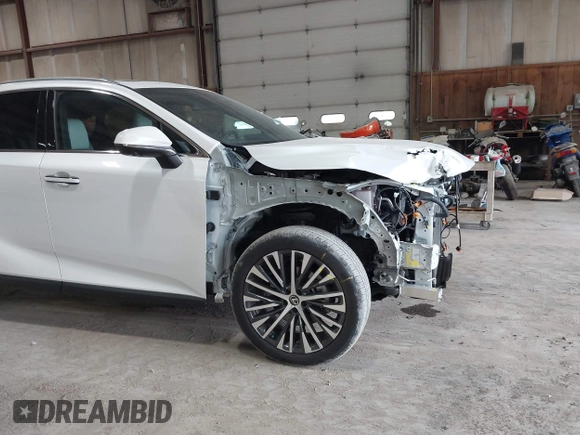 2024 Lexus RX 350h with VIN 2T2BBMCA6RC039544, listed as a IAAI auction lot 42224785 with 9,952 mi miles and . Bid and sale history available at DreamBid. Image 18.