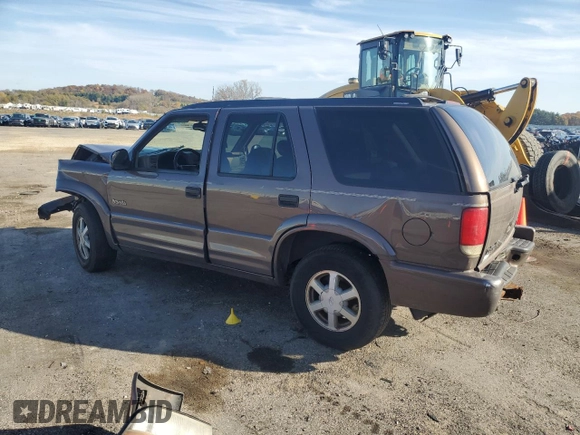 1998 Oldsmobile Bravada z VIN 1GHDT13W7W2702905, wystawiony jako Copart lot #77417944 z przebiegiem Nie podano mil oraz Nie do naprawy. Historia ofert i sprzedaży dostępna na DreamBid. Obrazek 2.