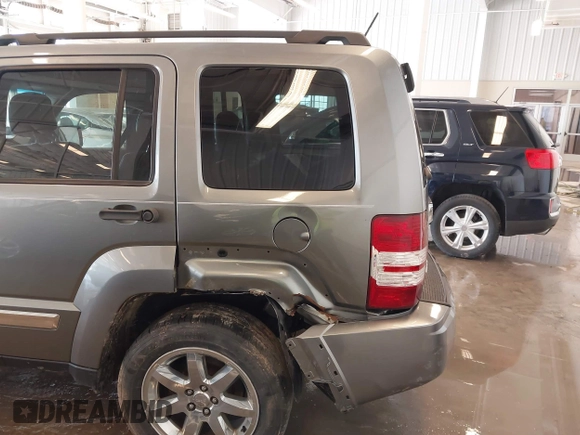 2012 Jeep Liberty Sport with VIN 1C4PJMAK9CW176792, listed as a IAAI auction lot 41685594 with 213,748 mi miles. Bid and sale history available at carsss.com. Image 17.