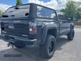 2014 GMC Sierra 1500 with VIN 3GTU2WEJ5EG424700, listed as a Copart auction lot 56500395 with 151,349 mi miles and Clean Title. Bid and sale history available at DreamBid. Image 4.