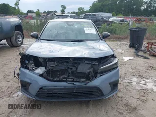 2023 Honda Civic Sport with VIN 2HGFE2F5XPH546709, listed as a IAAI auction lot 42453213 with 46,768 mi miles and . Bid and sale history available at DreamBid. Image 12.