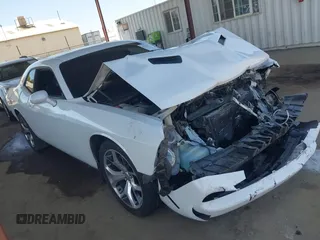 2015 Dodge Challenger SXT Plus with VIN 2C3CDZBG4FH700256, listed as a IAAI auction lot 42347772 with 103,406 mi miles and . Bid and sale history available at DreamBid. Image 1.