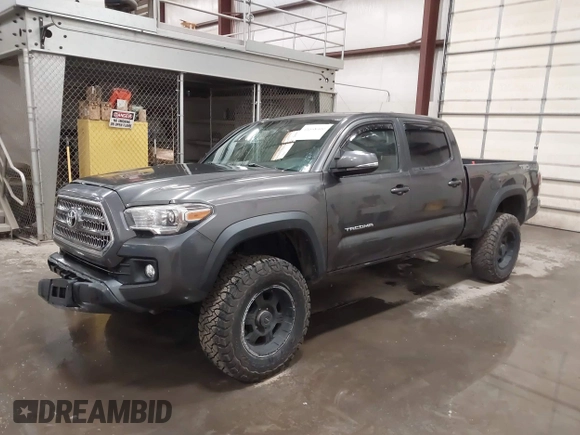 2017 Toyota Tacoma SR5 with VIN 3TMDZ5BN8HM016825, listed as a IAAI auction lot 41658400 with 166,098 mi miles. Bid and sale history available at carsss.com. Image 17.