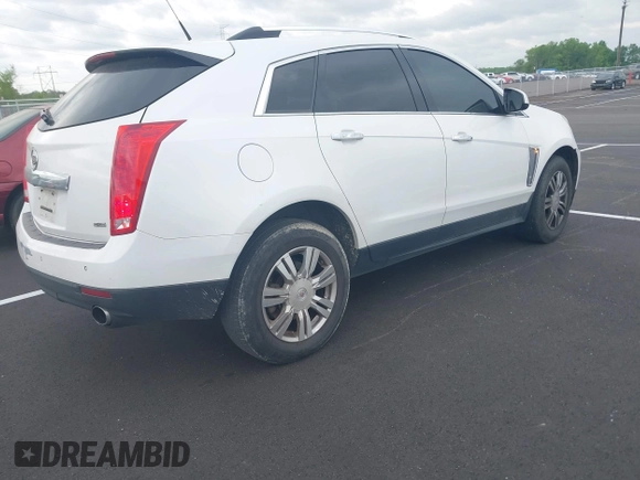 2014 Cadillac SRX Luxury Collection with VIN 3GYFNBE36ES519705, listed as a IAAI auction lot 42069288 with 211,632 mi miles and . Bid and sale history available at carsss.com. Image 4.