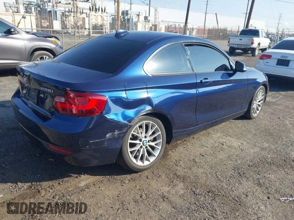 2015 BMW 2 Series 228i xDrive with VIN WBA1F7C5XFV367287, listed as a IAAI auction lot 40802463 with 113,427 mi miles and . Bid and sale history available at carsss.com. Image 4.