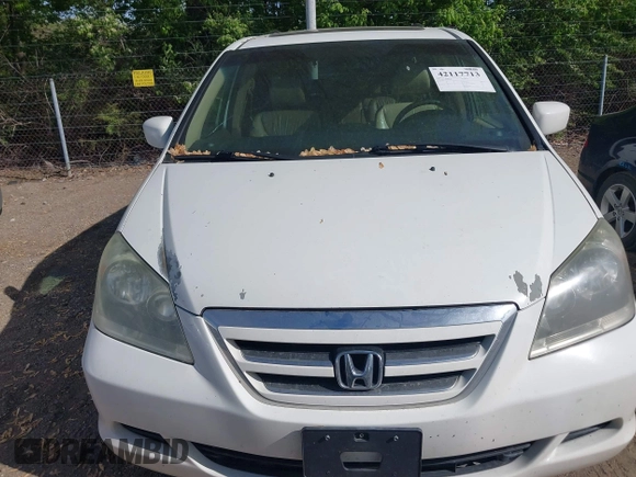 2007 Honda Odyssey EX-L with VIN 5FNRL38707B145049, listed as a IAAI auction lot 42117713 with 76,691 mi miles. Bid and sale history available at carsss.com. Image 6.