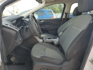 2014 Ford Escape SE z VIN 1FMCU9GX5EUC60849, wystawiony jako Copart lot #60498575 z przebiegiem Nie podano mil oraz Szkoda całkowita • Salvage title. Historia ofert i sprzedaży dostępna na DreamBid. Obrazek 7.