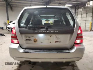 2003 Subaru Forester XS with VIN JF1SG65673H714885, listed as a Copart auction lot 74063684 with 298,649 mi miles and Salvage Title. Bid and sale history available at carsss.com. Image 6.