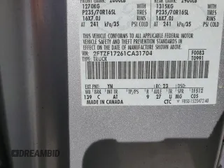 2001 Ford F-150 XL z VIN 2FTZF17261CA31704, wystawiony jako Copart lot #49744315 z przebiegiem 165 613 mil mil oraz Szkoda całkowita • Salvage title. Historia ofert i sprzedaży dostępna na DreamBid. Obrazek 14.