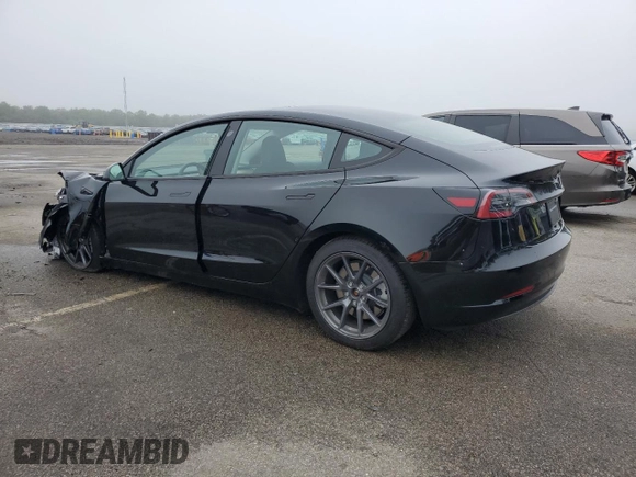 2023 Tesla Model 3 with VIN 5YJ3E1EA9PF687187, listed as a Copart auction lot 61044055 with 7,007 mi miles and Salvage title. Bid and sale history available at DreamBid. Image 2.