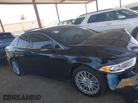 2020 Ford Fusion Titanium with VIN 3FA6P0RU8LR141324, listed as a IAAI auction lot 42004026 with 107,136 mi miles and . Bid and sale history available at DreamBid. Image 13.